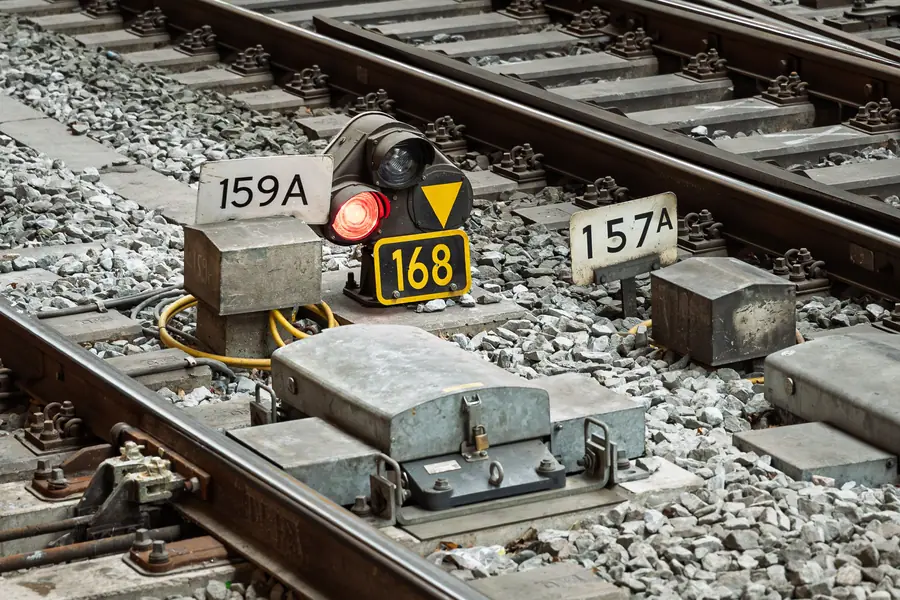 Railroad switch machinery and signals on the track ballast